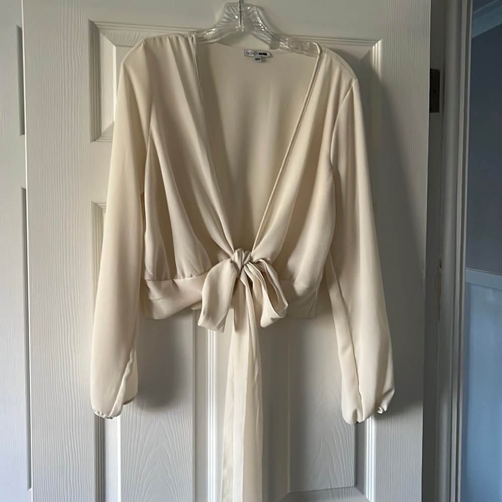 Never worn Fashion Nova cream wrap top